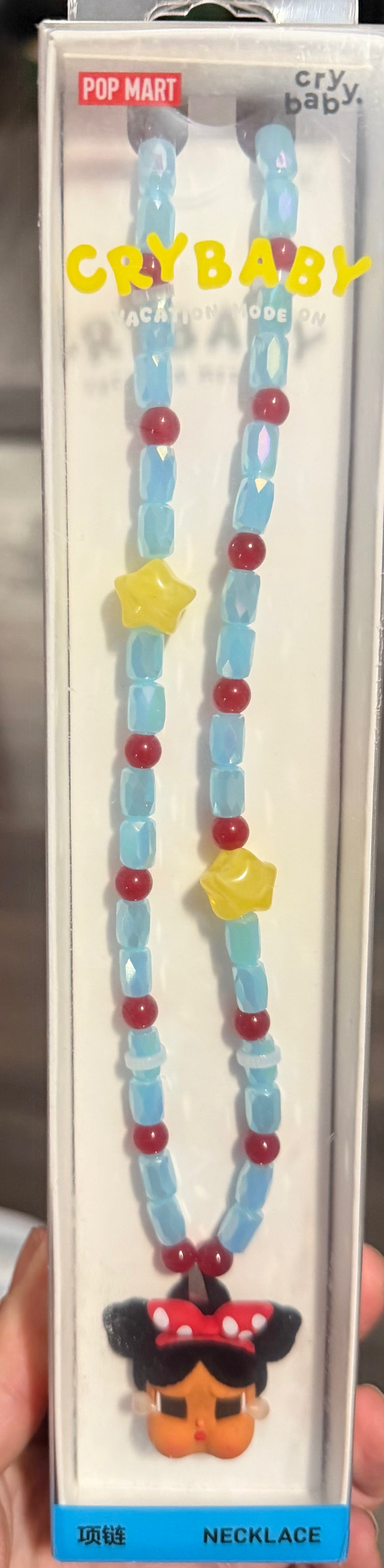 Cry baby vacation mode on necklace