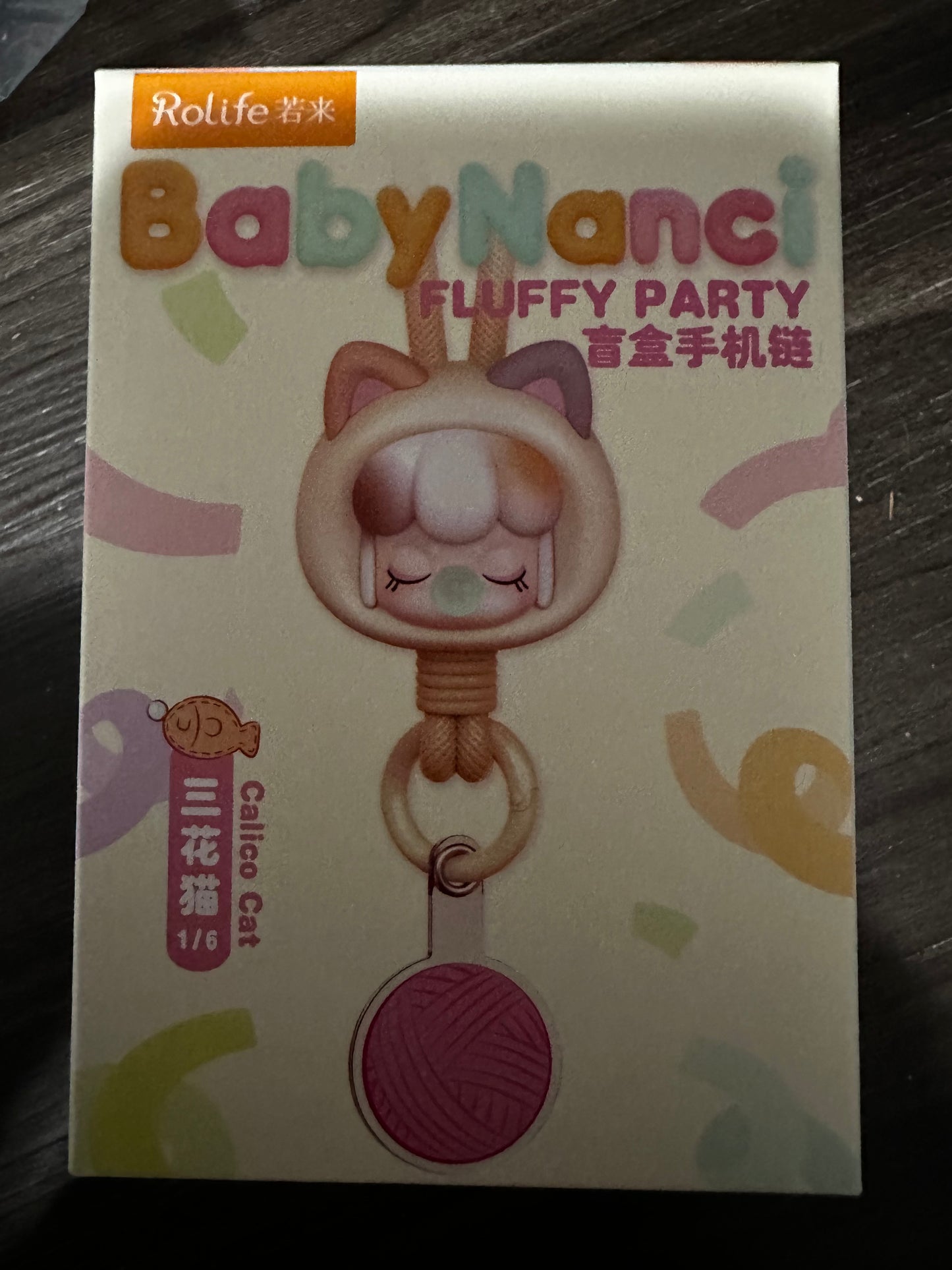 BabyNanci Fluffy Party blind box charm, specifically the "Calico Cat" version