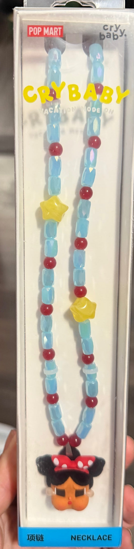 Cry baby vacation mode on necklace