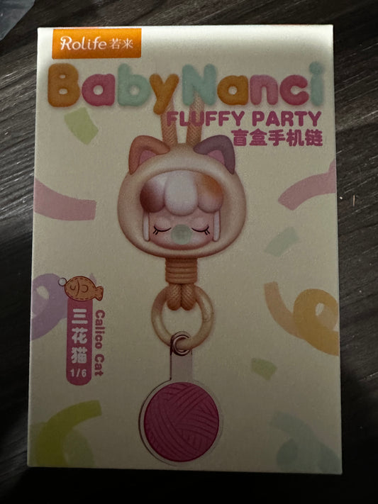 BabyNanci Fluffy Party blind box charm, specifically the "Calico Cat" version