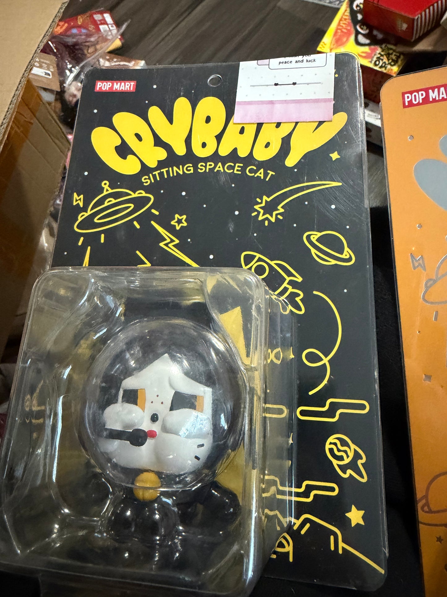 Cry baby sitting space cat